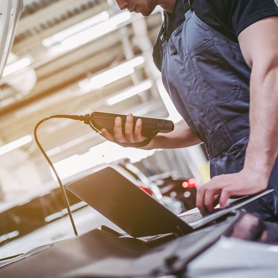 Mechanic-Diagnosing-Faults-Reading-Codes